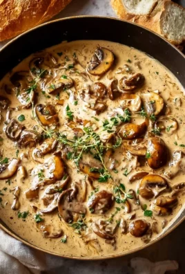 Creamy mushroom sauce poured over pasta