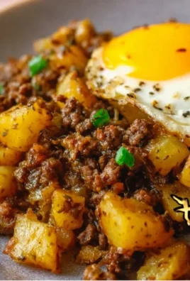 Delicious hamburger hash served in a skillet with beef and veggies