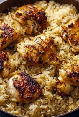 Oven baked chicken served with rice in a delicious hearty dish