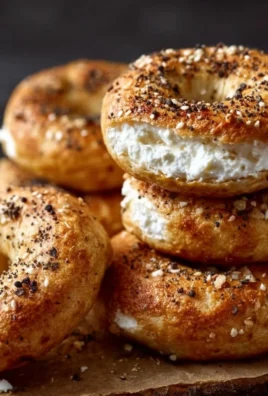High-protein cottage cheese bagels topped with seeds and herbs