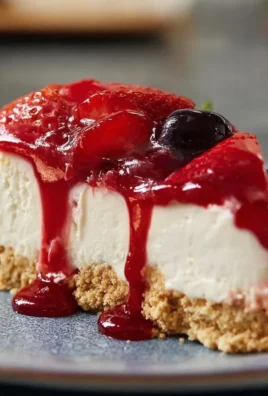 Delicious No-Bake Cherry Cheesecake ready for summer events and holidays.