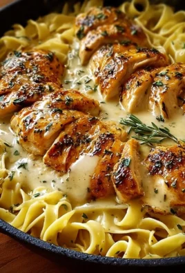 One-Pan Chicken served with creamy buttered noodles on a plate