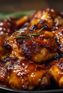 Delicious Sweet Baby Ray's Crockpot Chicken prepared in a slow cooker.