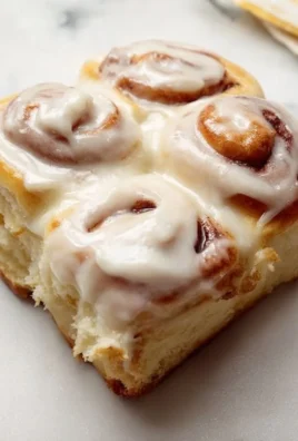 Delicious bread machine cinnamon rolls with cream cheese icing