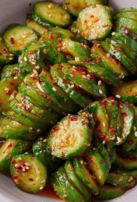 Asian spicy cucumber salad with vibrant colors and fresh ingredients
