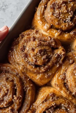 Delicious cookie butter espresso cinnamon rolls topped with creamy icing