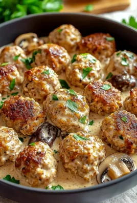 Creamy mushroom chicken meatballs served with fresh herbs