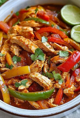 Delicious easy Crockpot Chicken Fajitas garnished with fresh vegetables