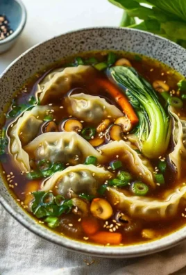 Bowl of Gyoza Soup with delicious dumplings in savory broth