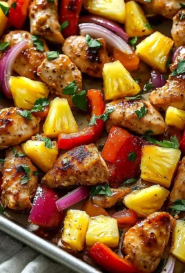 Hawaiian Chicken Sheet Pan with colorful vegetables and pineapple