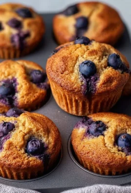 Delicious hearty blueberry protein muffins in a rustic setting