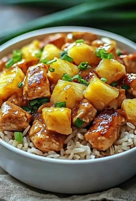 Delicious Pineapple Chicken and Rice dish garnished with fresh herbs