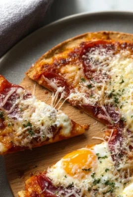 Delicious Pizza Eggs recipe featuring pizza toppings and eggs cooked to perfection.