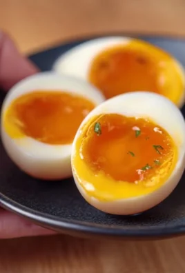 Delicious Ramen Eggs (Ajitama) garnished and ready to enhance noodle dishes.
