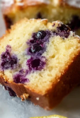 Soft and moist lemon blueberry yogurt cake with fresh blueberries