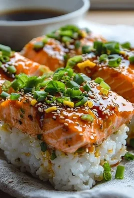 Baked spicy salmon sushi dish served in a casserole with toppings