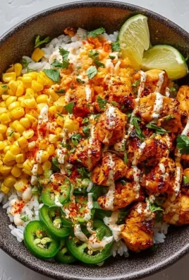 Delicious Street Corn Chicken Rice Bowl with juicy chicken and flavorful corn
