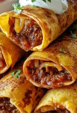 Plate of crispy baked and air-fried taquitos ready to serve.