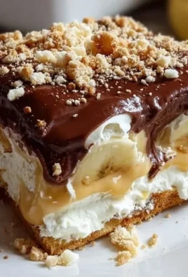 Delicious banana pudding eclair cake layered with creamy pudding and ripe bananas