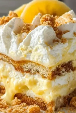 Delicious banana pudding lasagna dessert with layers of cream and banana