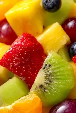 Colorful fruit salad for kids with various fresh fruits