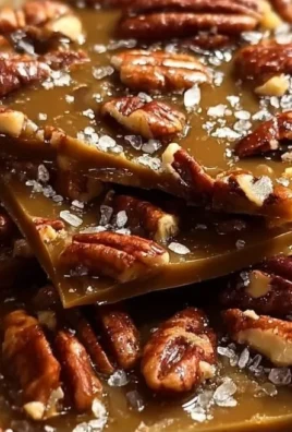 Delicious homemade butter pecan toffee bark with nuts on a plate