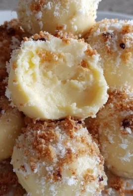 Delicious creamy cheesecake balls rolled in graham cracker crumbs