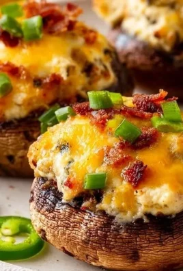 Easy jalapeño popper stuffed mushrooms on a serving platter