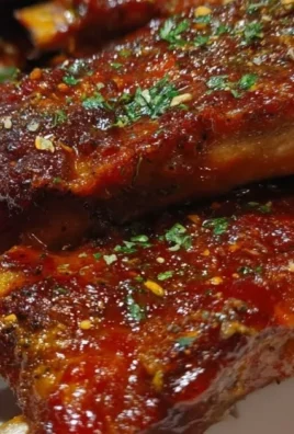 Delicious easy lamb spare ribs served on a plate with herbs and spices