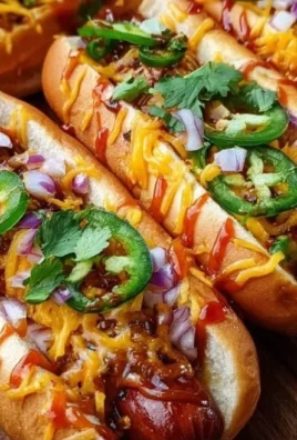 Firecracker hot dogs garnished with spices and sauces for a sweet and spicy flavor