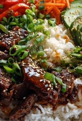 Korean BBQ Steak Rice Bowl with vegetables and rice on a plate