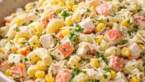 Pasta salad with surimi, corn, and grated cheese