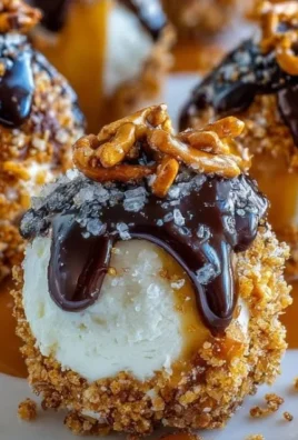 Salted Caramel Pretzel Cheesecake Balls on a white plate