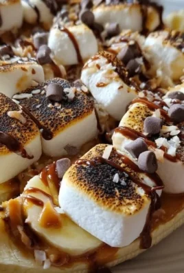 S'mores Banana Boats with melted chocolate and marshmallows
