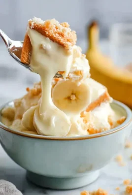 Delicious traditional banana pudding dessert in a glass bowl