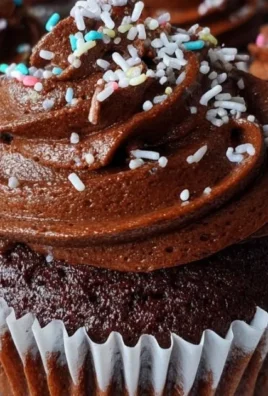 Ultimate double chocolate cupcakes with rich frosting and sprinkles
